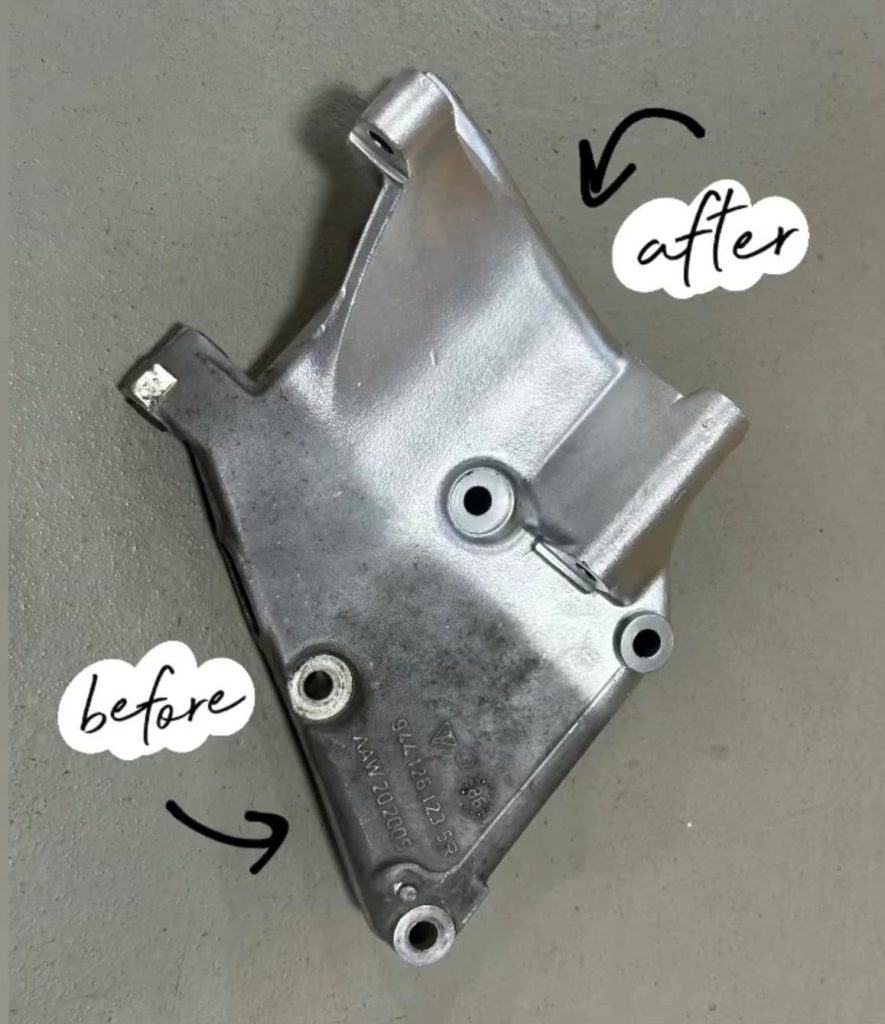 Before photo of a corroded and oxidized aluminum engine component showing decades of grime prior to vapor blasting at Cantech Automotive in Syracuse.