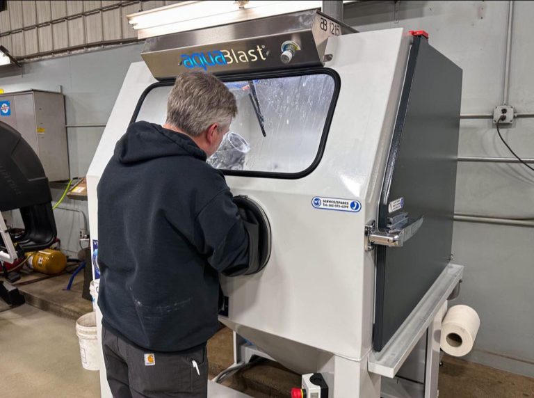 A Porsche engine intake manifold and cover being restored to a factory-fresh satin finish using the Vixen AquaBlast vapor blasting service at Cantech Automotive in Syracuse, NY.
